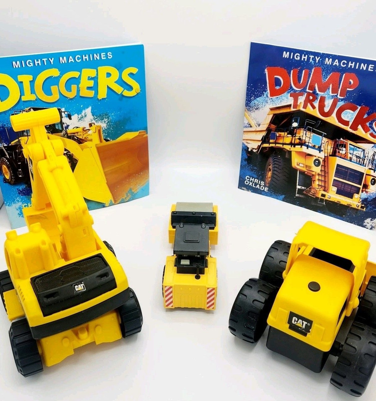 CAT Machines Lot of 3 Toy Construction Vehicles and 2 Books