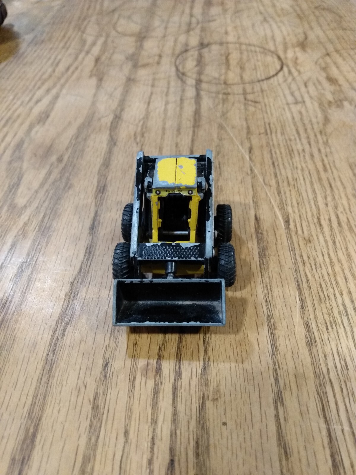ERTL Mighty Movers New Holland L555 Skid Steer Loader DieCast 1:64