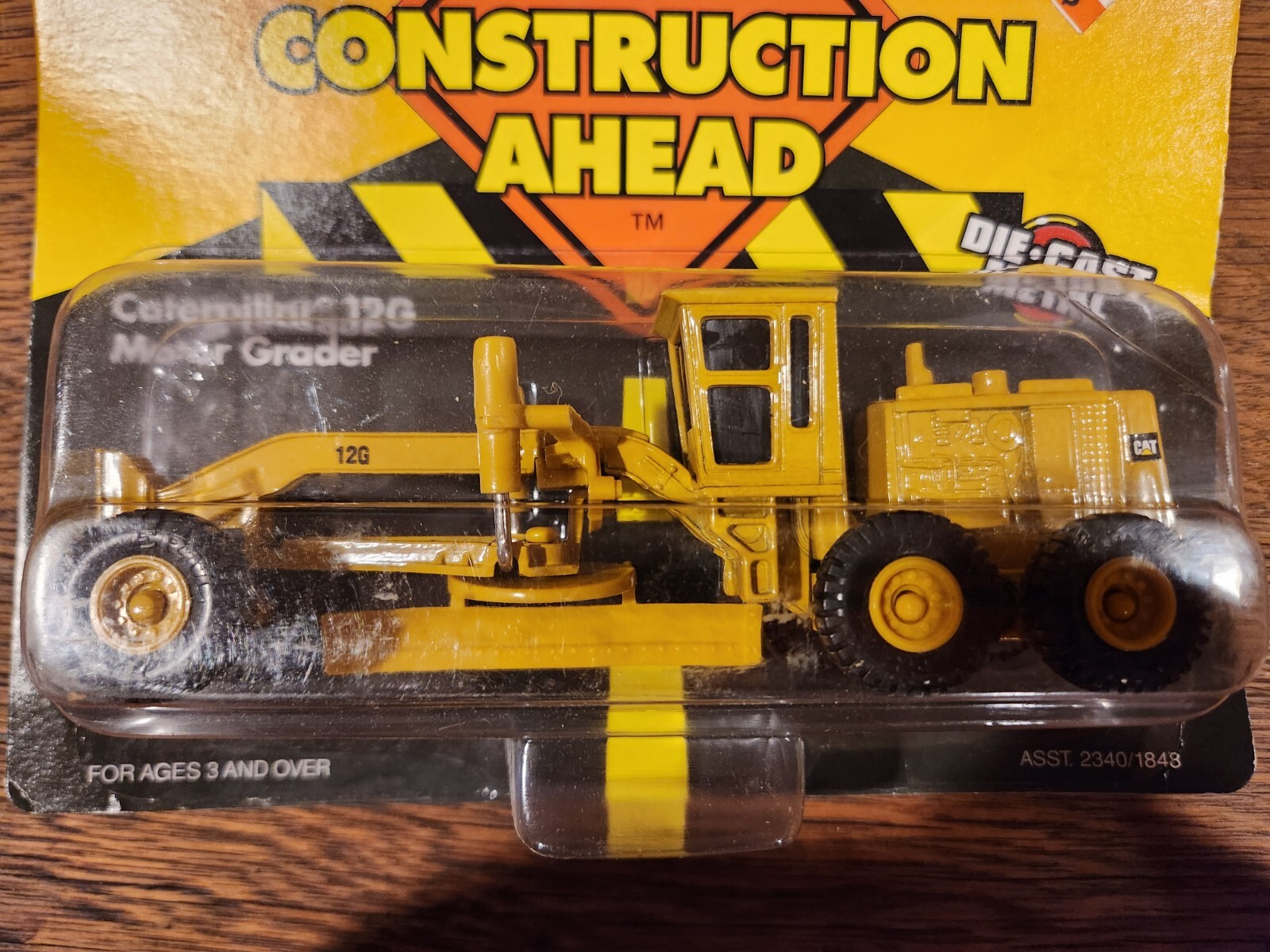 Ertl Road Construction Ahead Caterpillar 12G Motor Grader CAT. Die-cast NEW