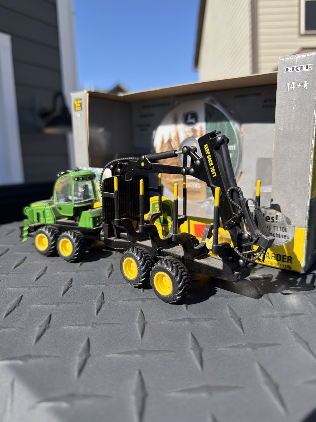 1:50 John Deere 1110E Log Forwarder Prestige Collection By Ertl