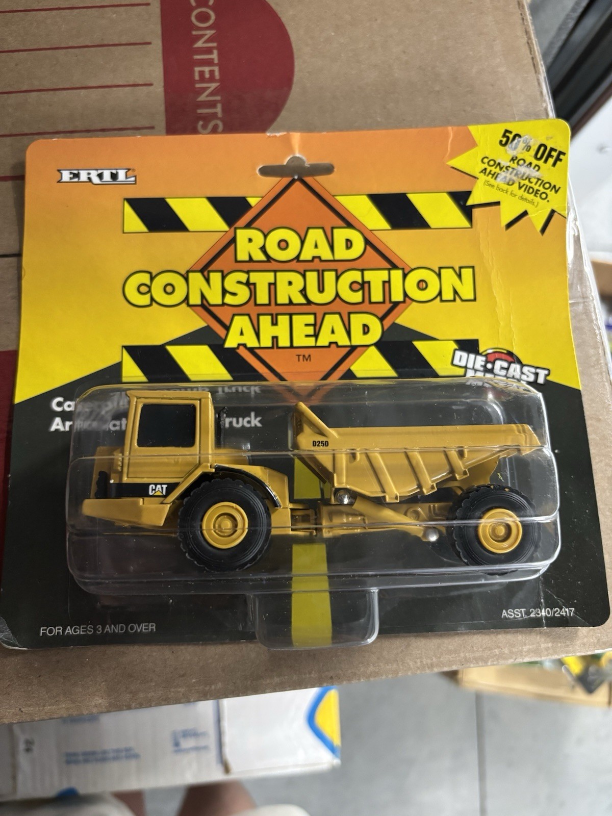 ERTL Road Construction Ahead Caterpillar D25D Articulated Dump Truck