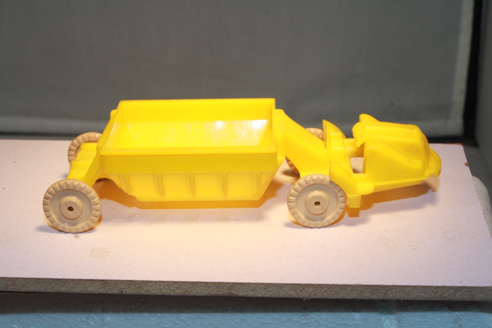 1950s Plastic Earth Mover Toy Banner Toys Made in USA