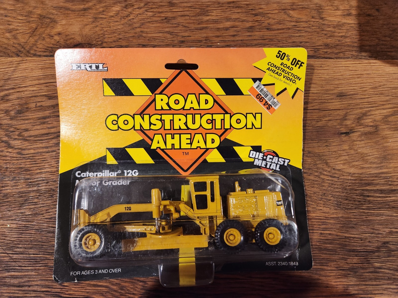 Ertl Road Construction Ahead Caterpillar 12G Motor Grader CAT. Die-cast NEW