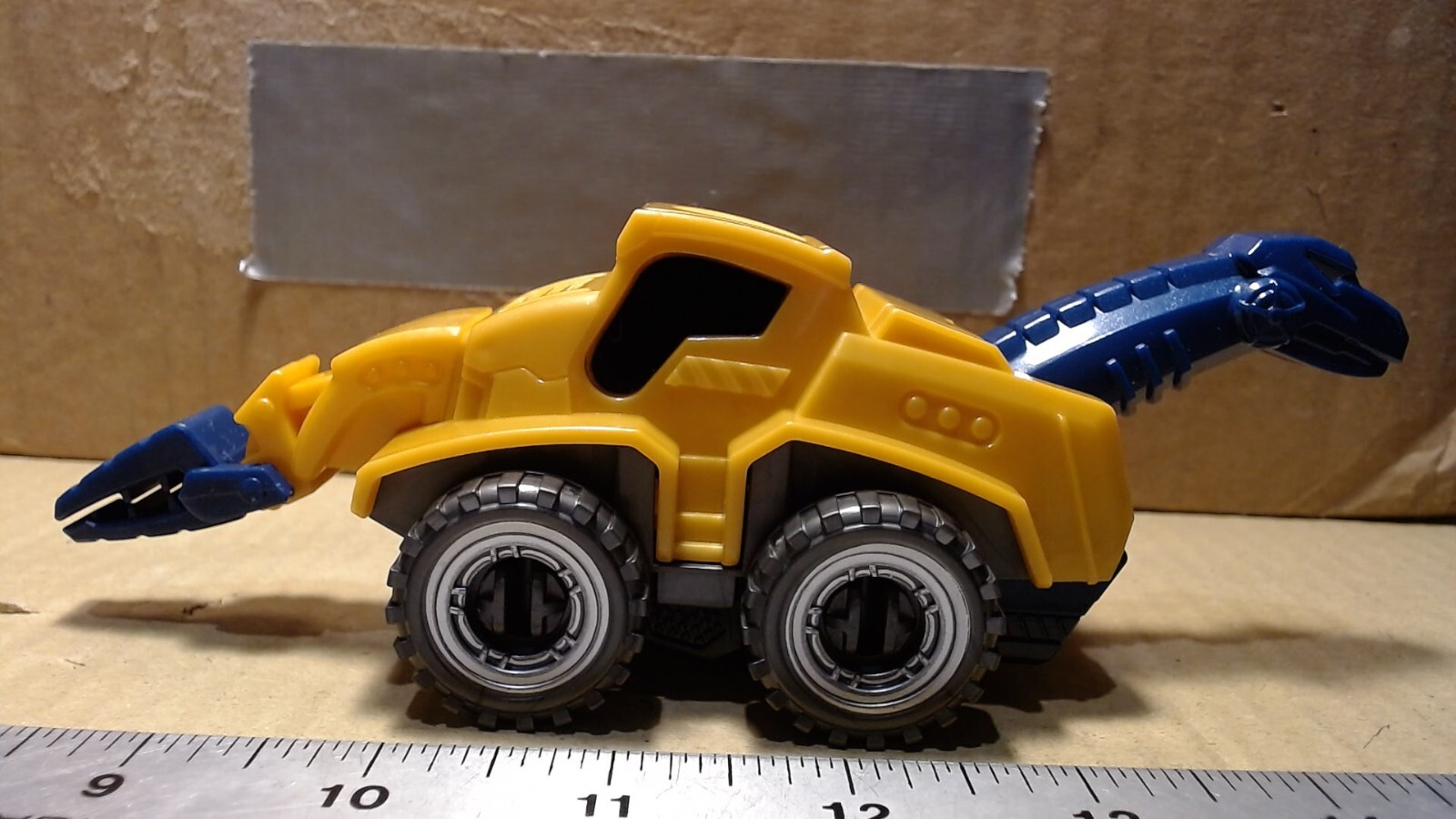 Unbranded Gold Dinasaur Construction Vehicle Plastic With Clamping Tail 8&Prime; L