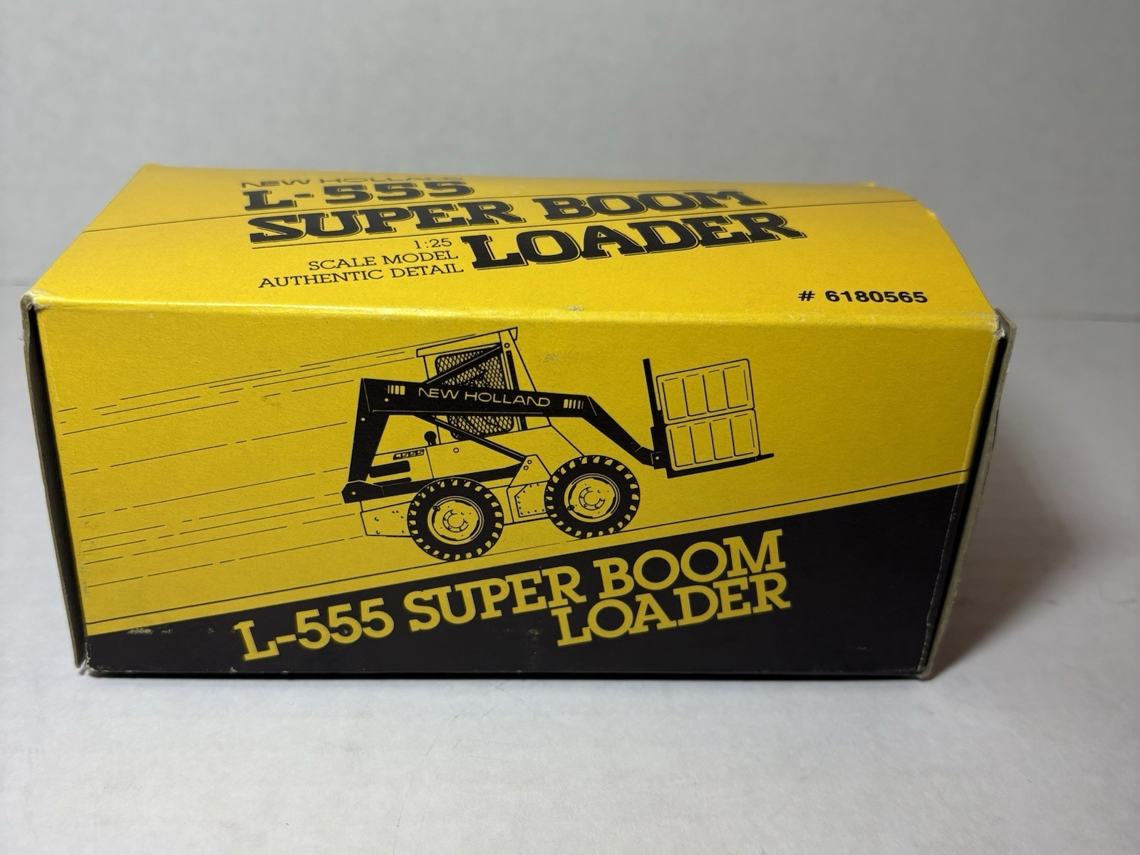 NZG New Holland L-555 Super Boom Loader, Diecast 1/25
