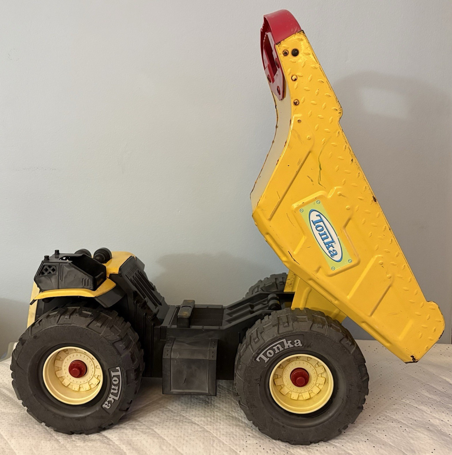 Tonka Yellow Dump Truck Construction Vehicle Toy w/ Red Handle, Black & Red