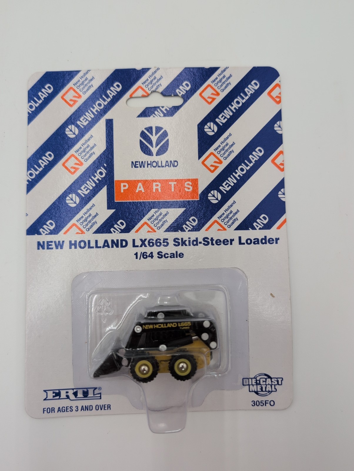 1/64 Ertl Farm Toy New Holland LX665 Turbo Hydraulic Skid Steer Loader