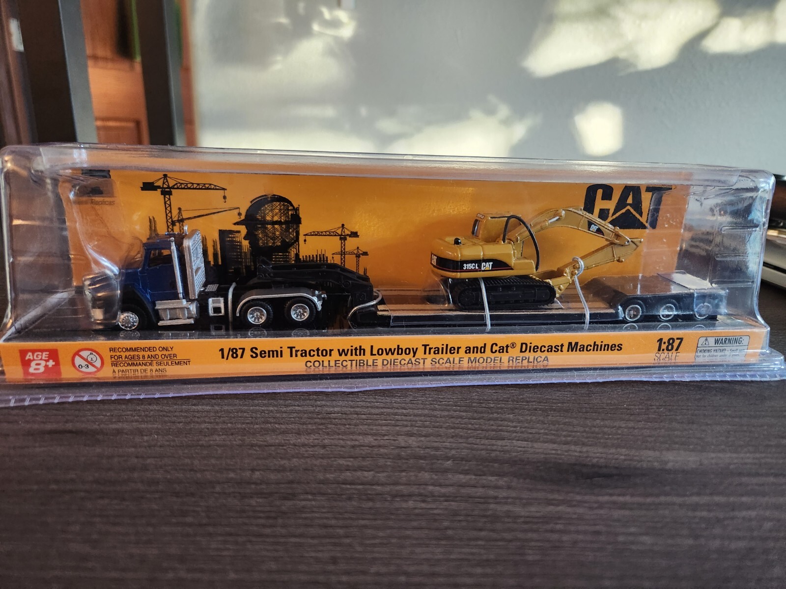 CAT CT660 DAY CAB TRACTOR w/LOWBOY TRAILER & CAT 315C HYDRAULIC EXCAVATOR – 1:87