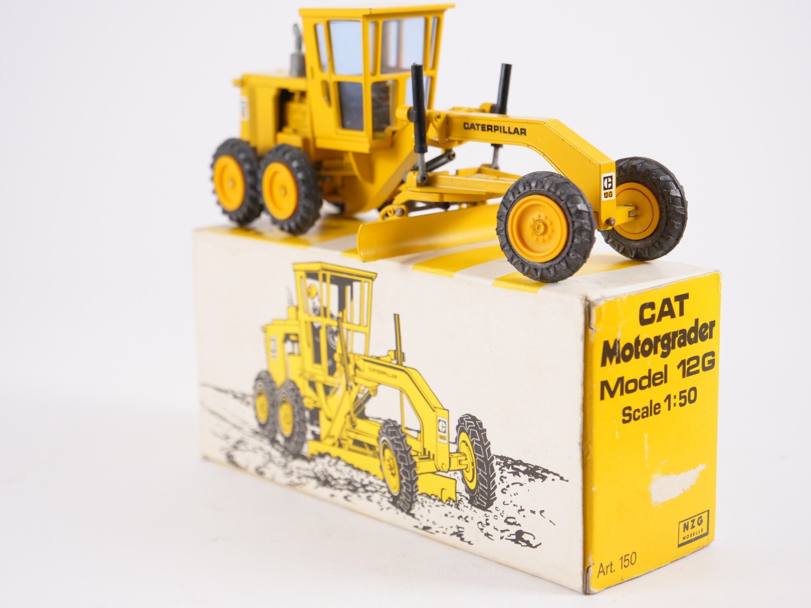 NZG 150 CAT Motor Grader 12G CATERPILLAR Construction Vehicle 1:50 Yellow Box