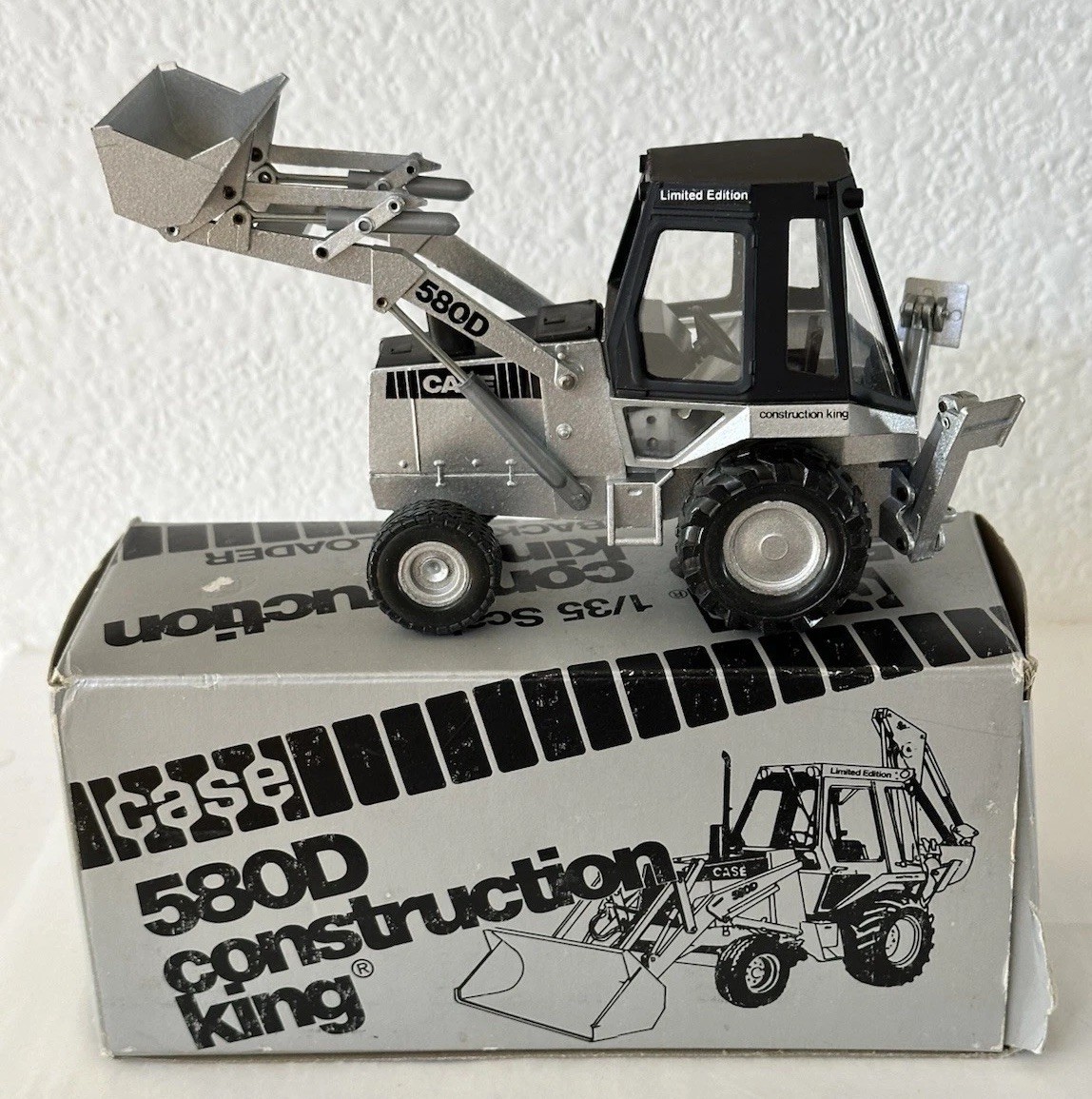 Case 580D Construction King 1:35 Silver Anniversary Diecast Backhoe Loader