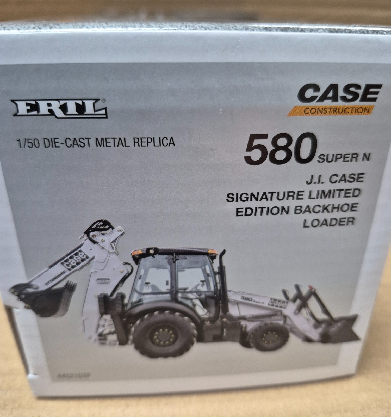 1/50 JI Case 580 Super N Backhoe Loader, Silver Signature Limited Edition, ERTL