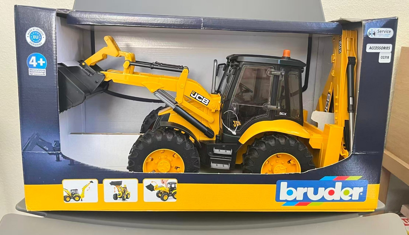 JCB 5CX Eco Backhoe Loader (model 02454) designed to a 1:16 scale Toy