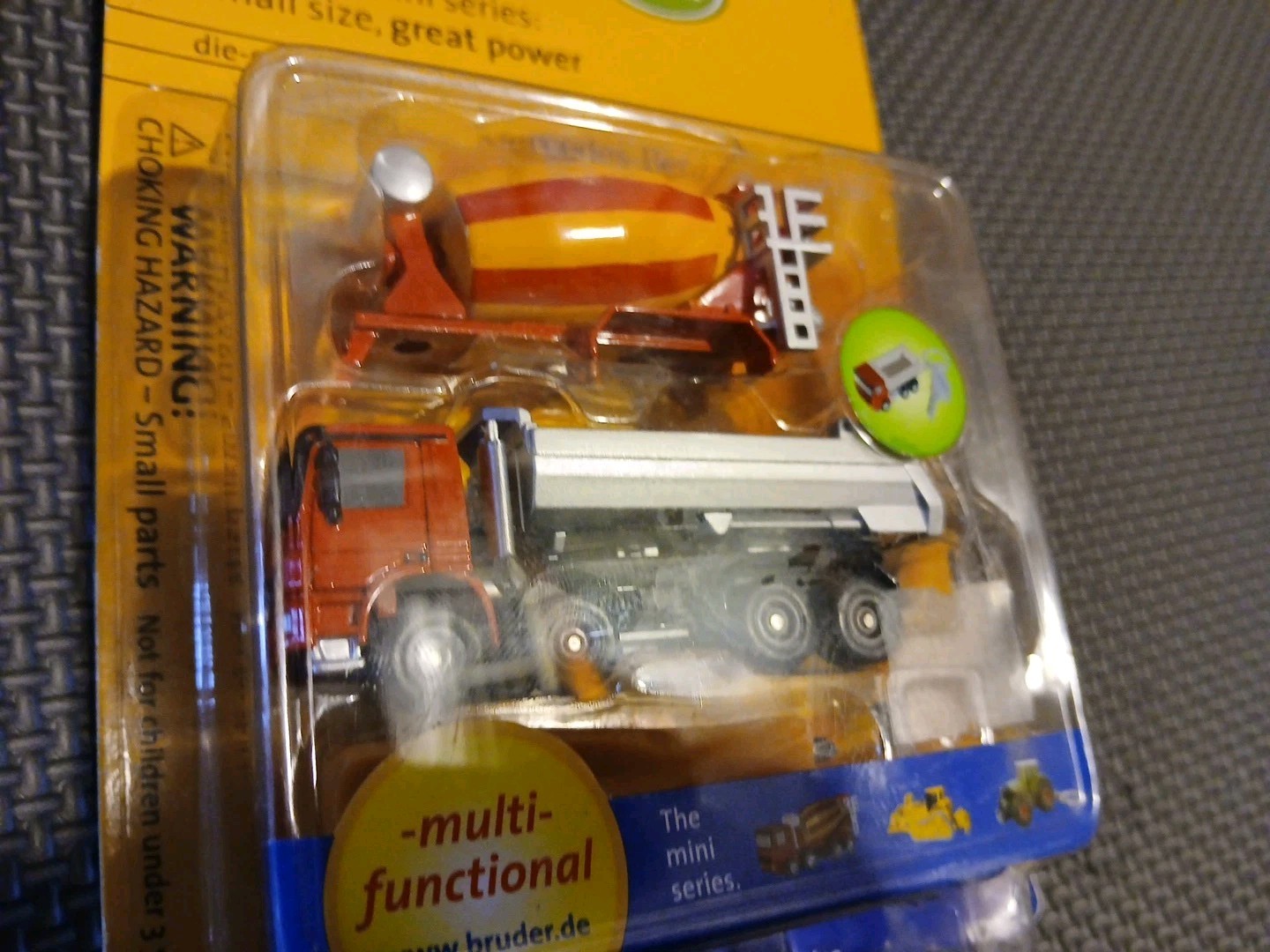 Bruder Toys 1:128 Mini Mercedes-Benz Actros Dump Truck / Cement Mixer Keychain