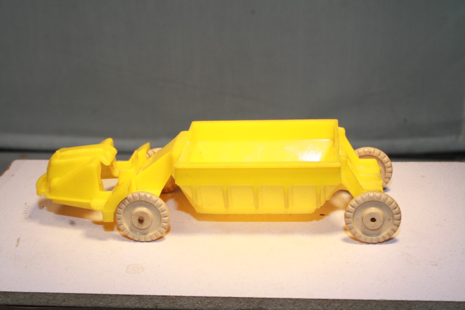 1950s Plastic Earth Mover Toy Banner Toys Made in USA