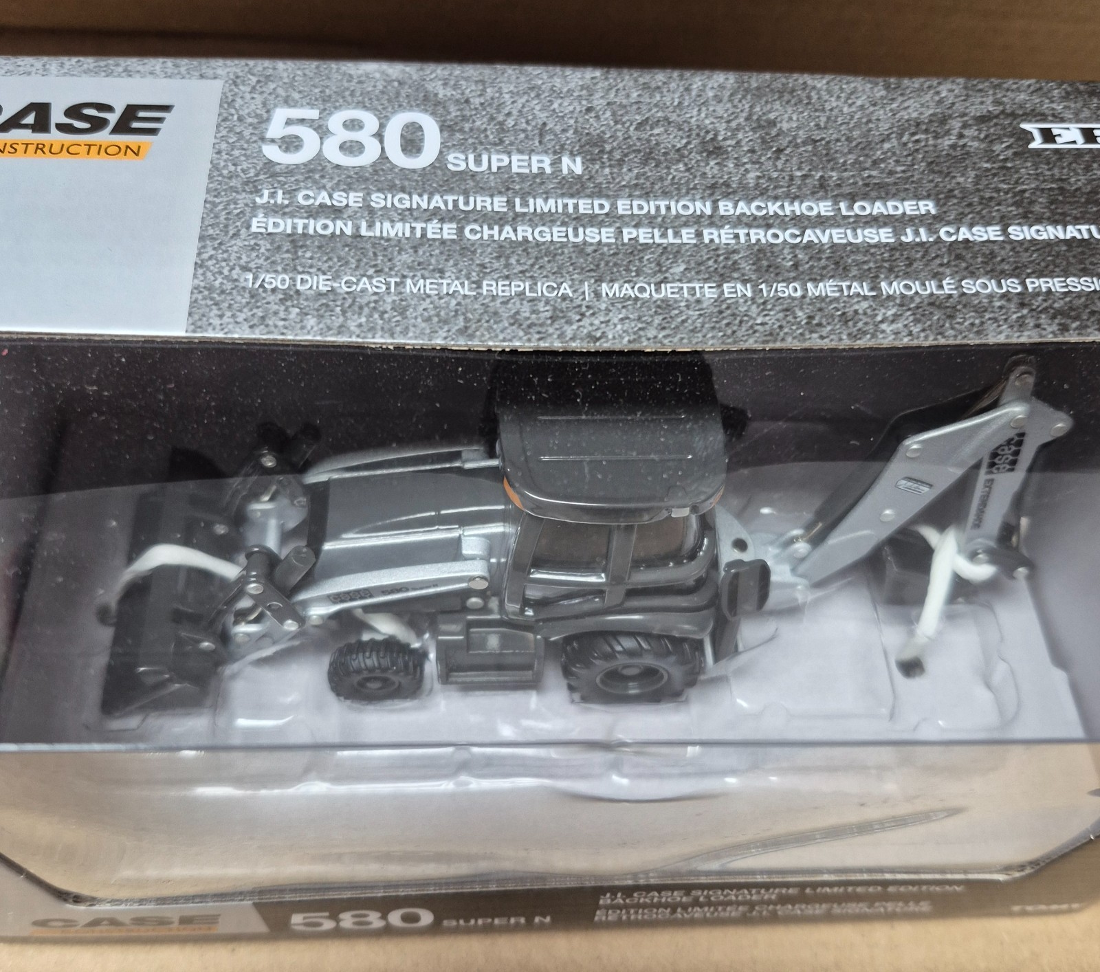 1/50 JI Case 580 Super N Backhoe Loader, Silver Signature Limited Edition, ERTL