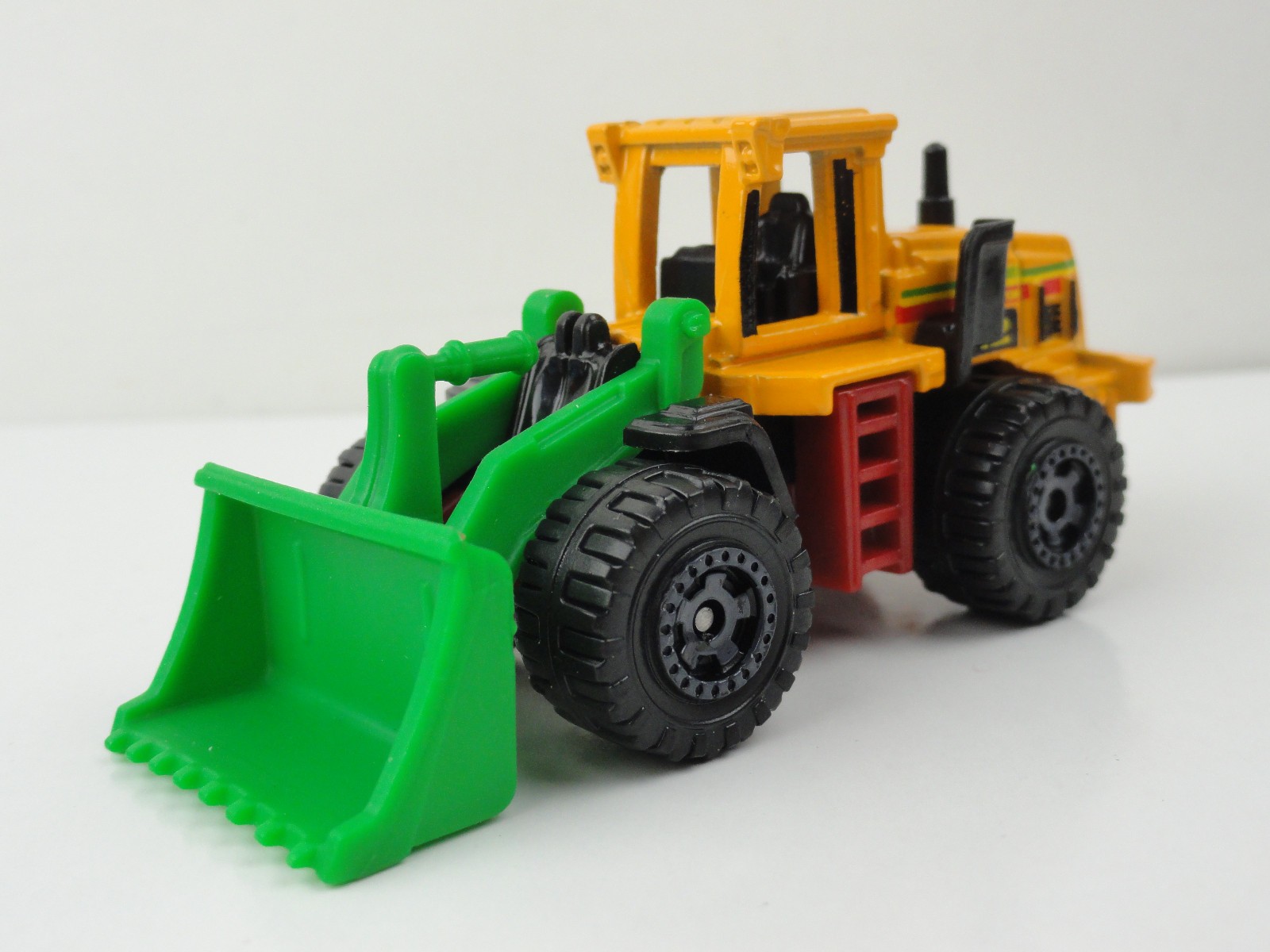 2012 Matchbox #91 Quarry King (Yellow Jones Bros. #12) – LOOSE