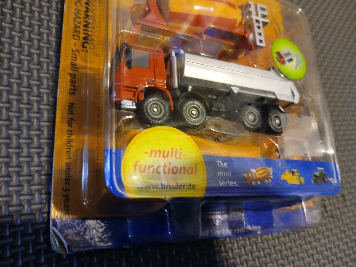Bruder Toys 1:128 Mini Mercedes-Benz Actros Dump Truck / Cement Mixer Keychain