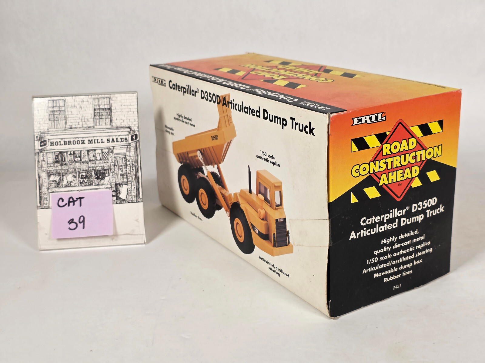 Ertl 2431 • Caterpillar • CAT D350D Articulated Dump Truck • 1:50 Scale