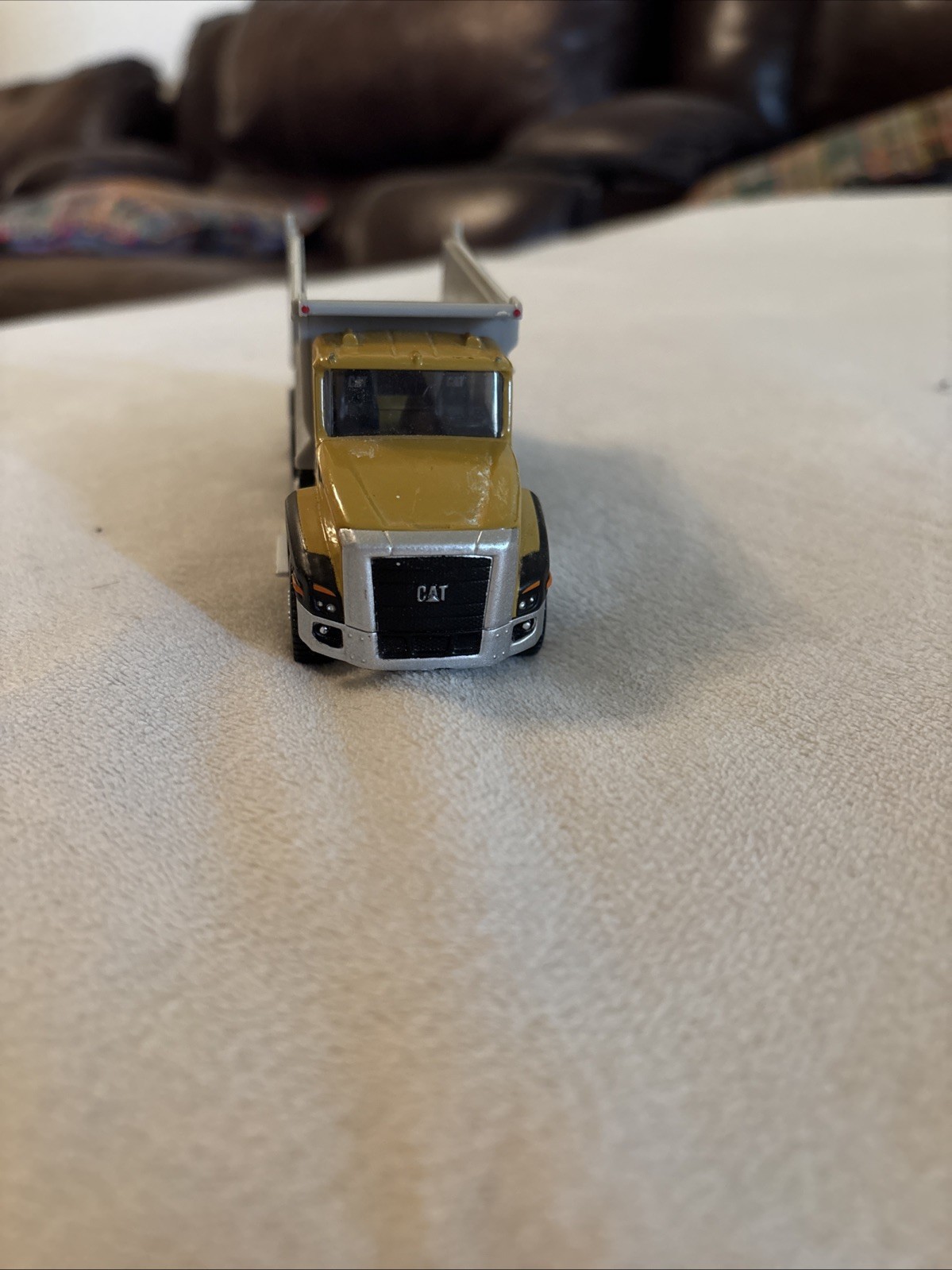 CAT Caterpillar CT660 Dump Truck 1:64 Scale Model – Diecast Masters 84643CS