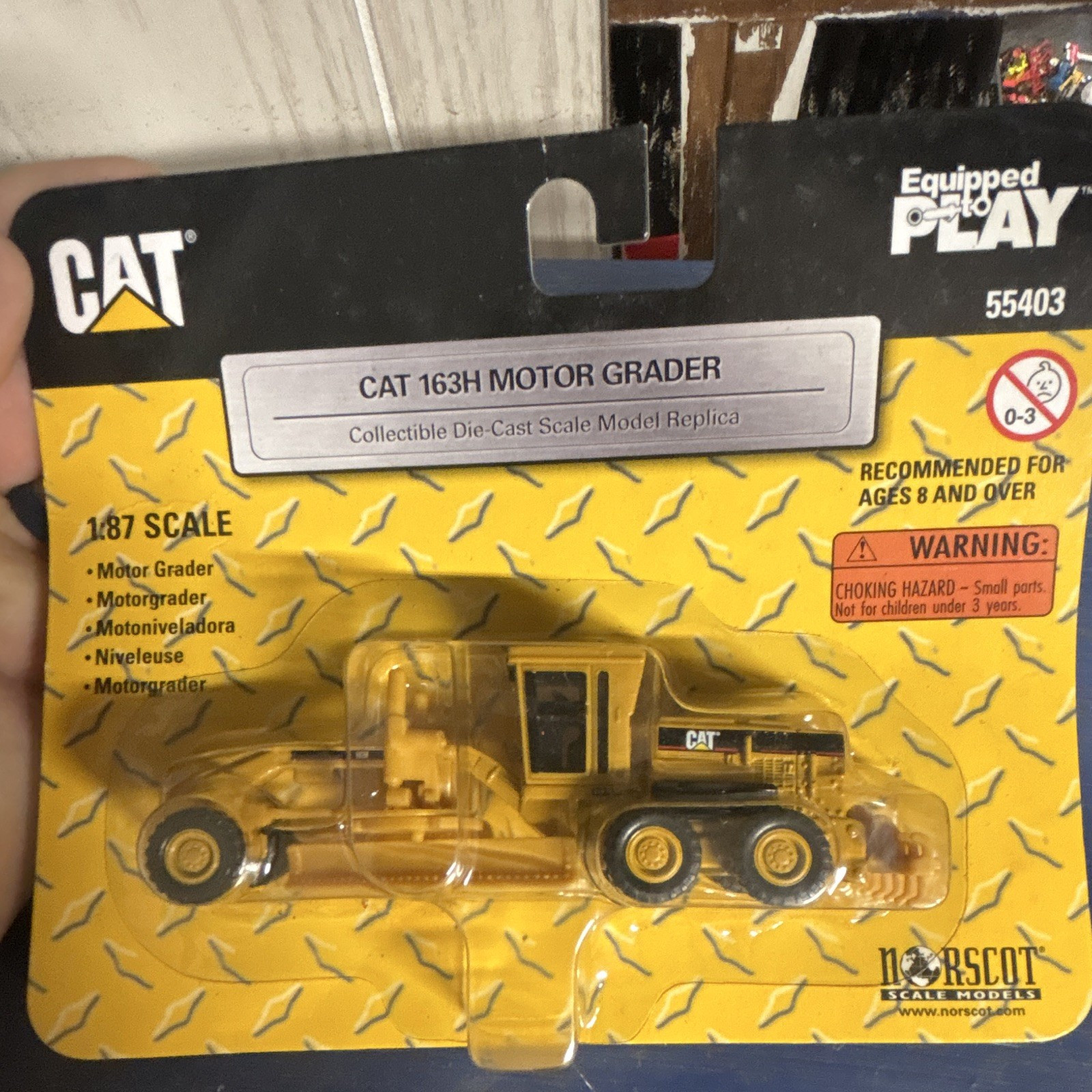 Norscot CAT 163H Motor Grader 1:87 Diecast Metal Yellow/Black 55403