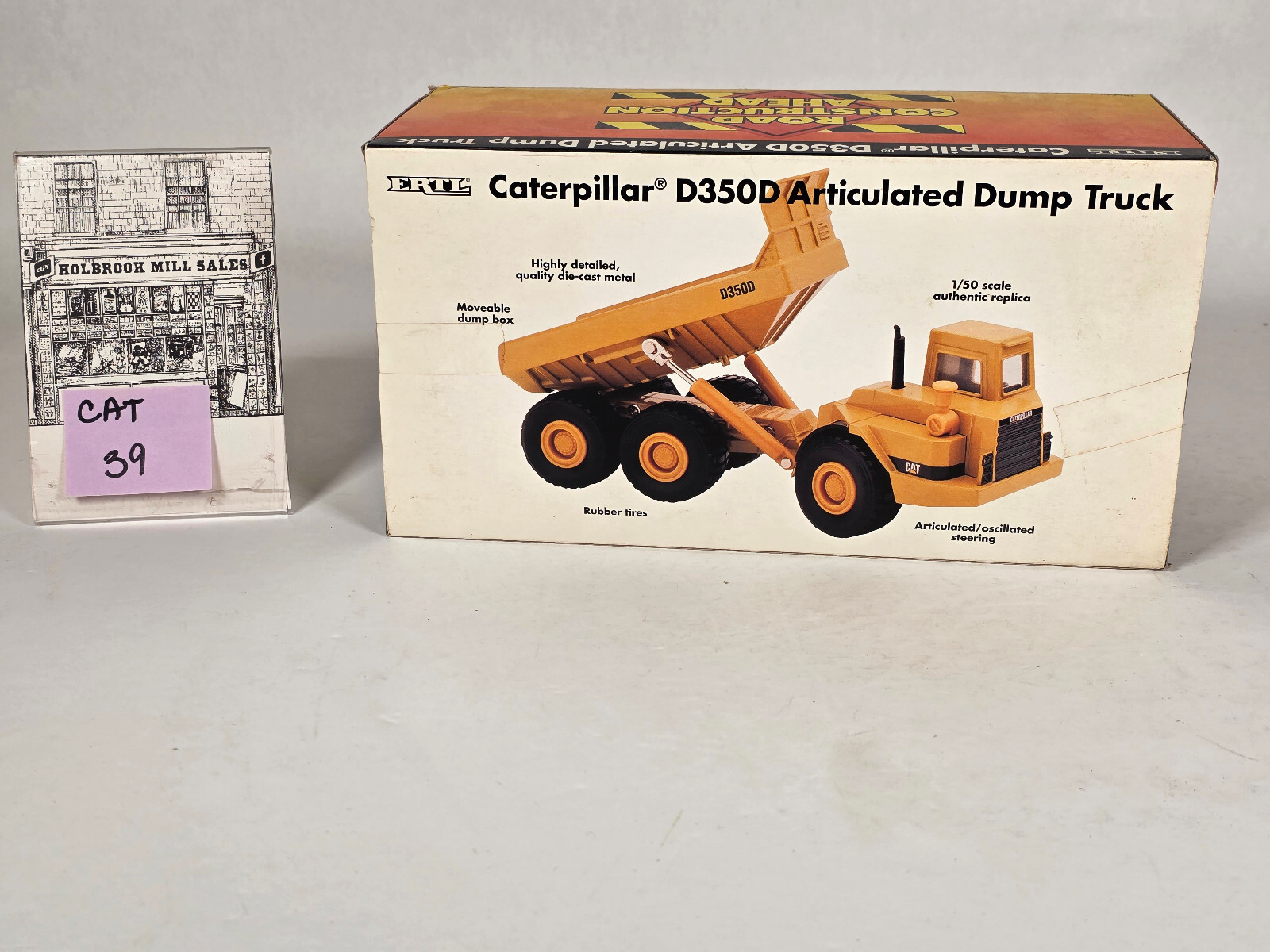 Ertl 2431 • Caterpillar • CAT D350D Articulated Dump Truck • 1:50 Scale