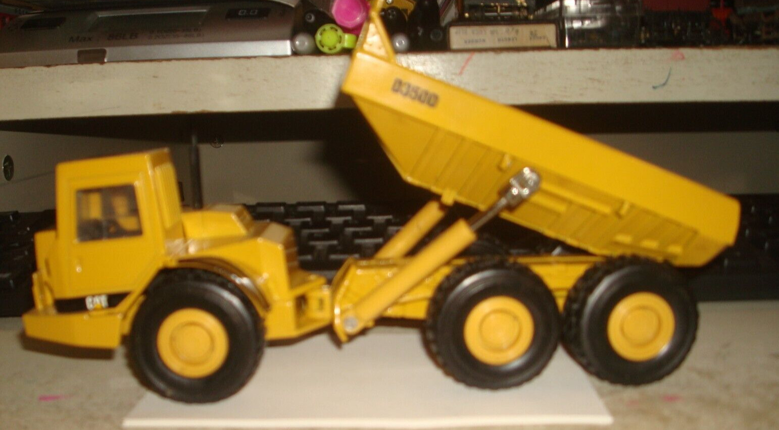 NORSCOT. ARTICULATED CAT D350D DUMP TRUCK. 1:50 SCALE