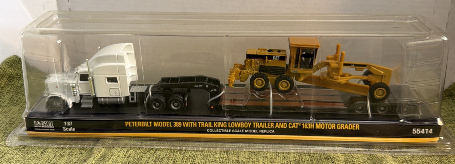 Norscot Peterbilt Model 389 w/ Trail King Lowboy Trailer & Cat 163H Motor Grader