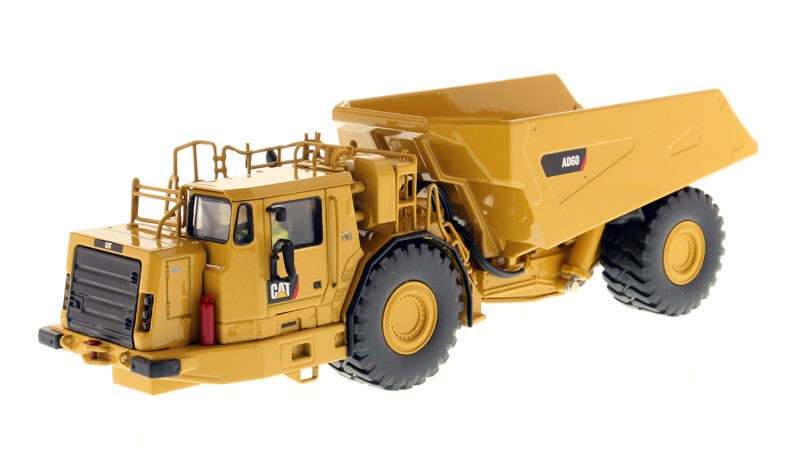 DIECAST MASTERS,Dumper CATERPILLAR AD60 tunnel boring machine with driver and…