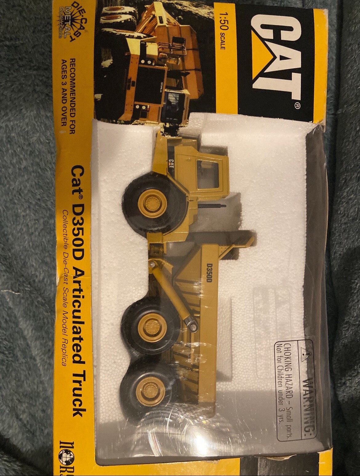 CAT D350D Articulated Truck 55700 – Never Opened, Small Tear In Box