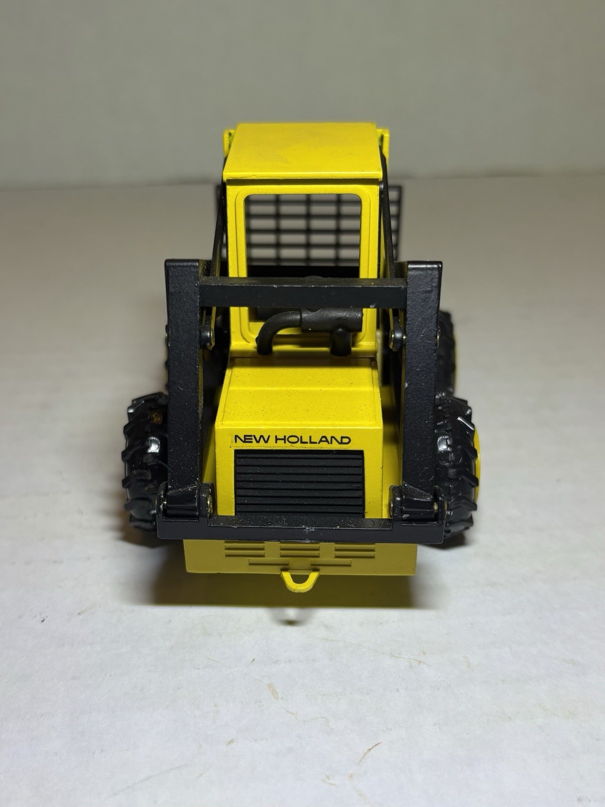 NZG New Holland L-555 Super Boom Loader, Diecast 1/25