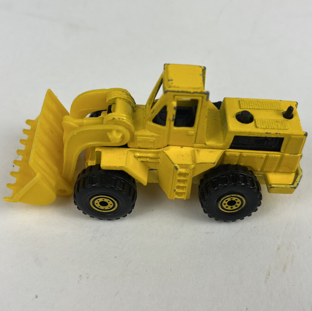 VTG 1979 Hot Wheels Caterpillar Front Loader Construction Yellow 1/64 Malaysia