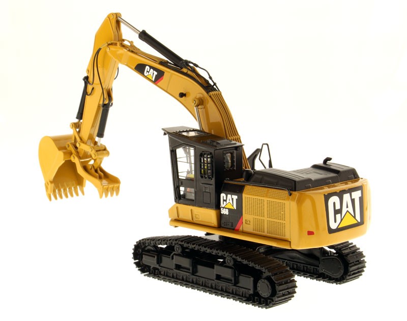DIECAST MASTERS – CATERPILLAR 568 GF Forestry Excavator with Driver and Box…