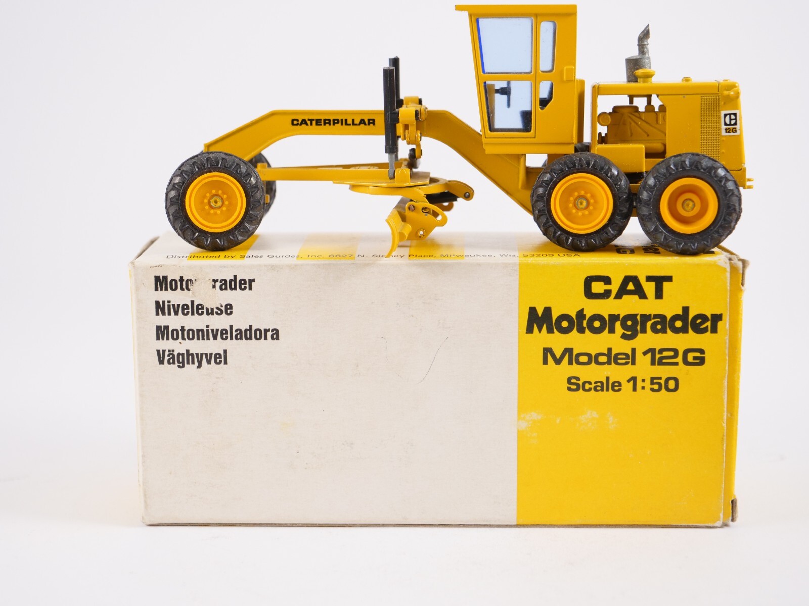 NZG 150 CAT Motor Grader 12G CATERPILLAR Construction Vehicle 1:50 Yellow Box