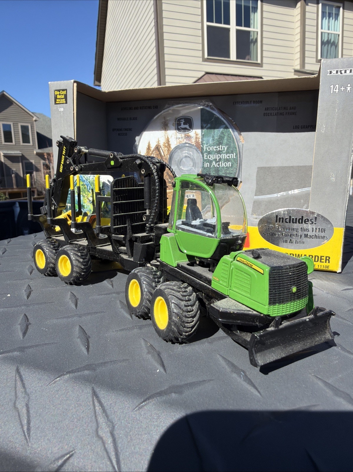 1:50 John Deere 1110E Log Forwarder Prestige Collection By Ertl