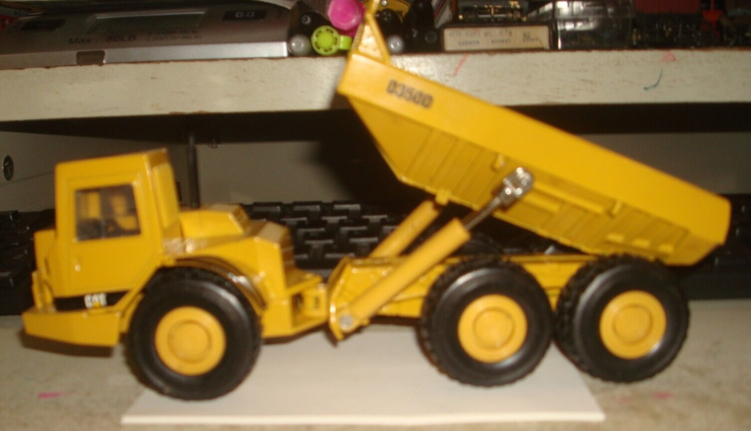 NORSCOT. ARTICULATED CAT D350D DUMP TRUCK. 1:50 SCALE