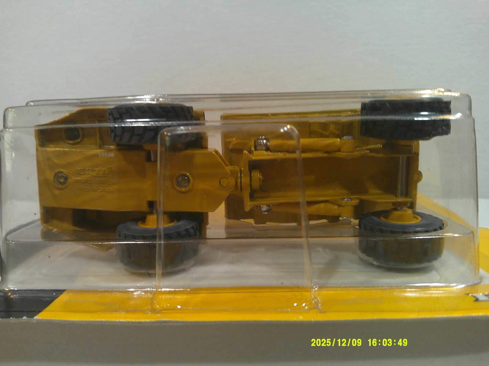 Ertl CAT D25D Articulated Dump Truck 1:64 Scale Darkish Yellow Fair Package