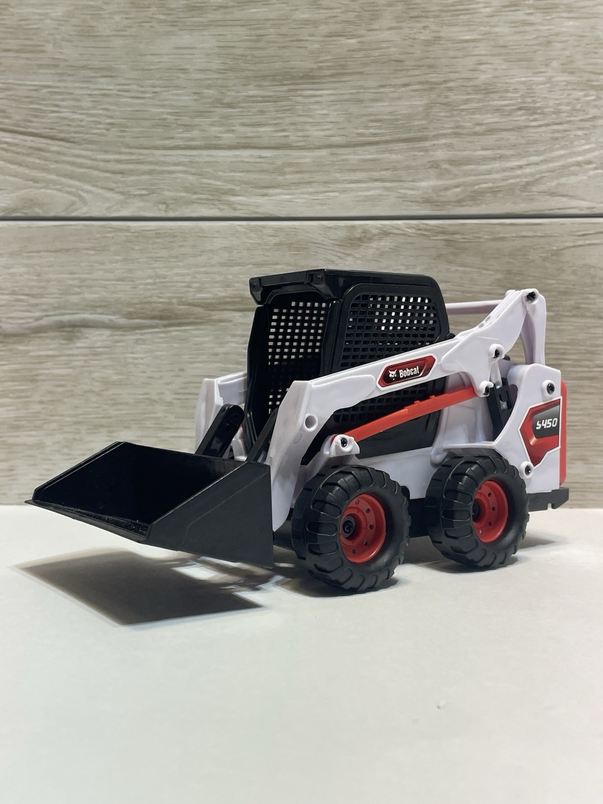 Bobcat Skid Loader Toy. Plastic.