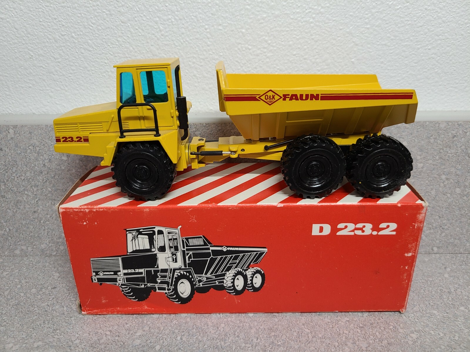 O&K Faun D23.2 Articulated Dump Truck – Yellow – NZG 1:50 Scale Model #301.1