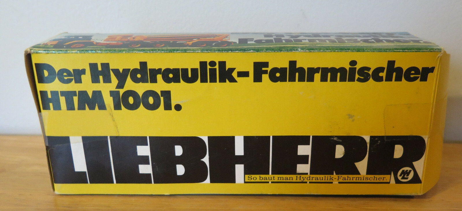 Der Liebherr Hydraulik Fahrmishcer HTM 1001 Diecast model Cement Mixer & box
