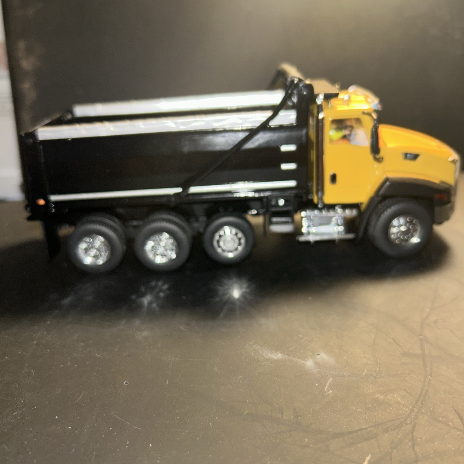 1:50 Caterpillar CT660 SBFA OX Bodies Stampede Dump Truck – Diecast Masters