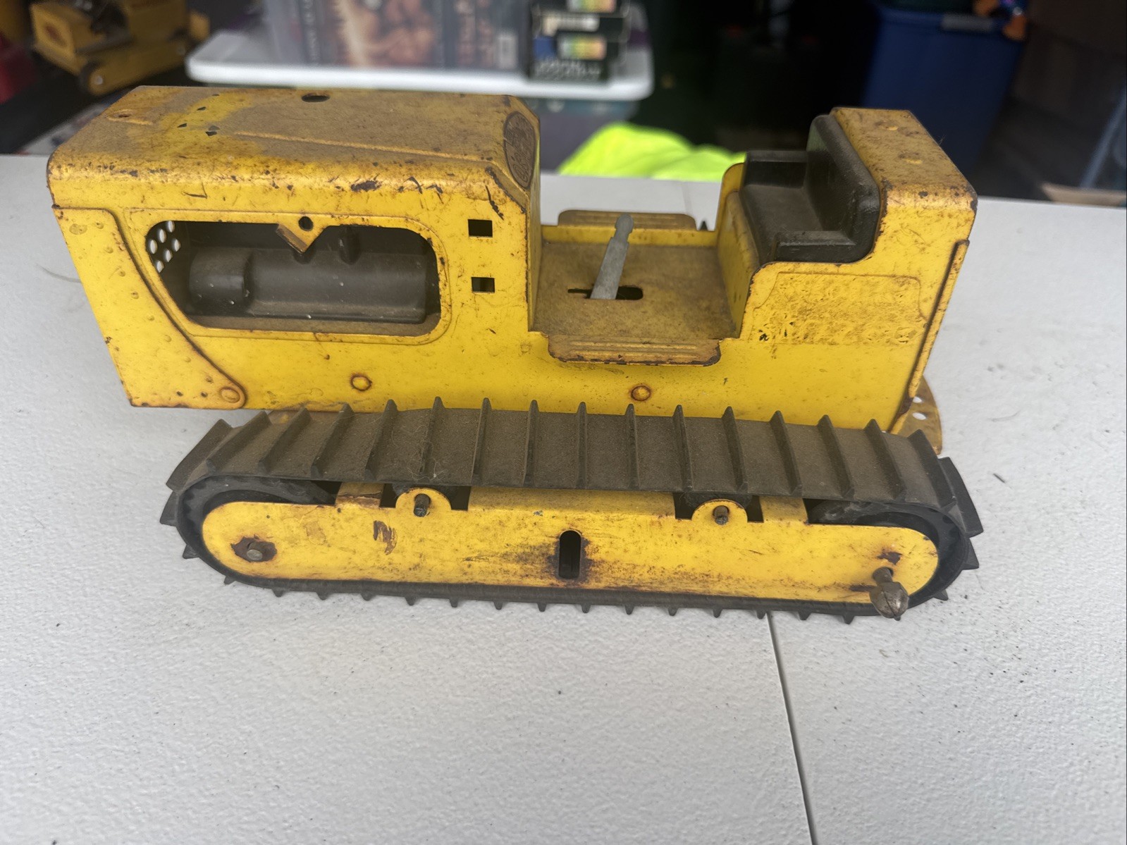 Vintage Toy Bulldozer, Yellow Black Painted Pressed Steel Missing the Blade