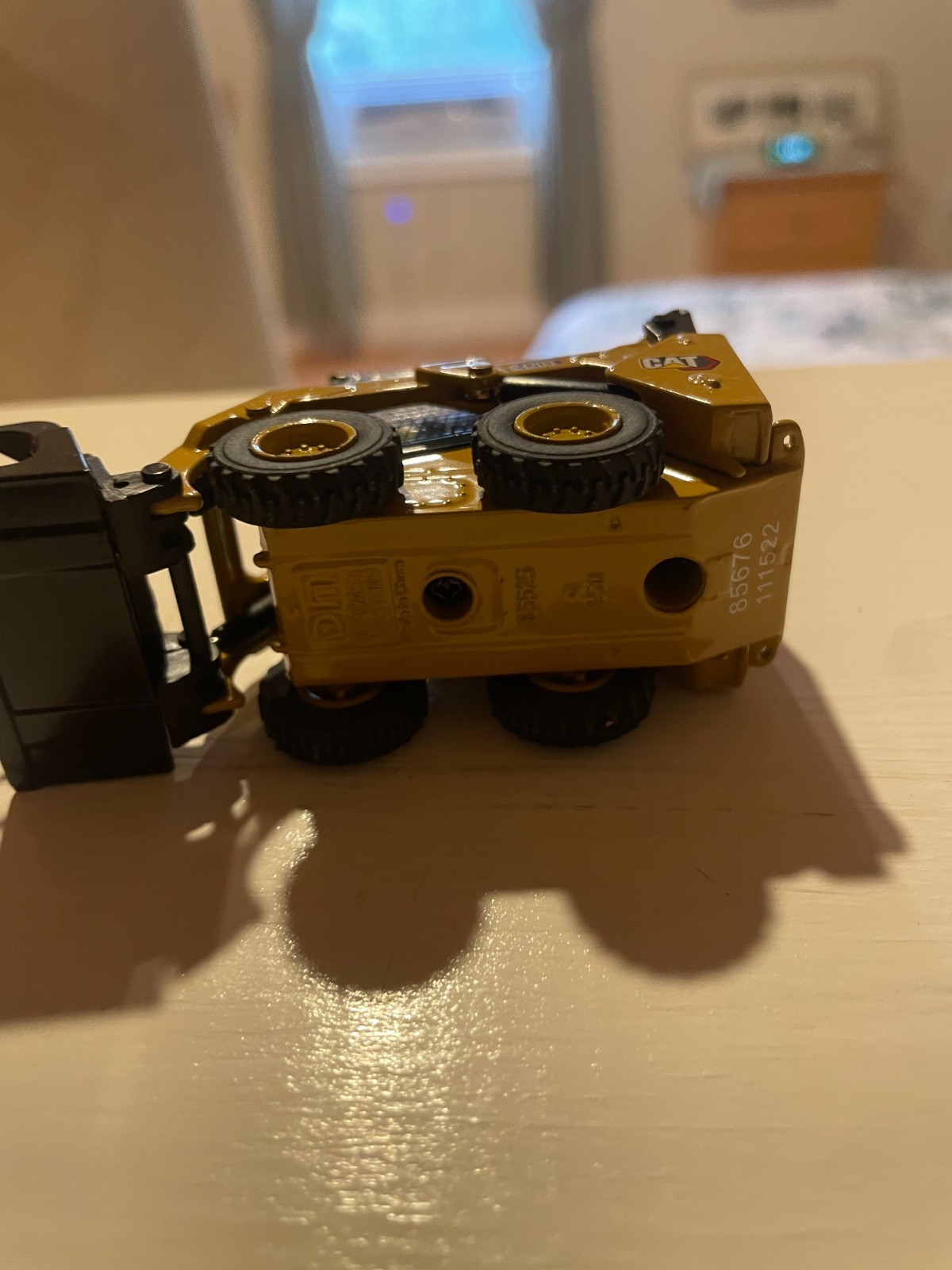 Diecast Masters 1/50 CAT 242D3 Skid Steer Loader w/ accessories 85676